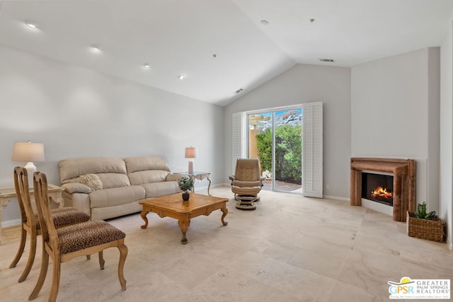 living room with lofted ceiling