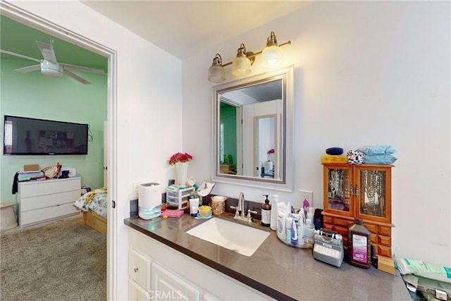 bathroom featuring vanity and ceiling fan