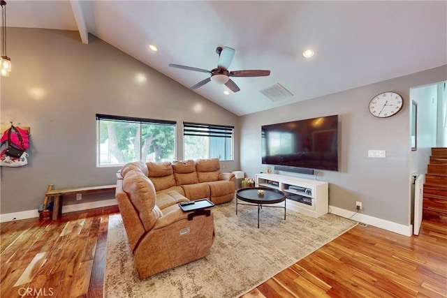 living room featuring ceiling fan, wood-type flooring, beam ceiling, and high vaulted ceiling