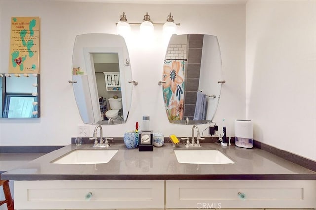 bathroom with vanity and a shower with shower curtain