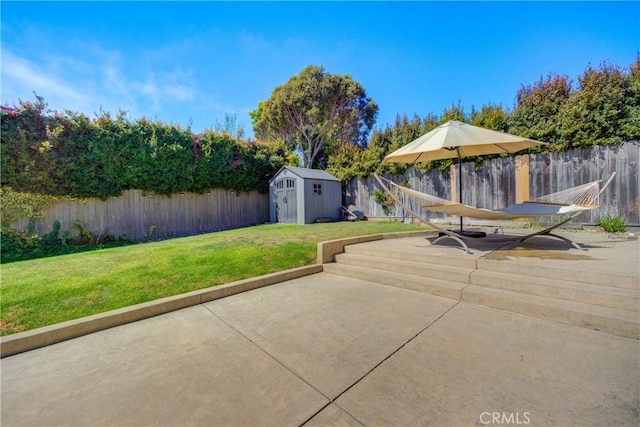 view of patio with a shed