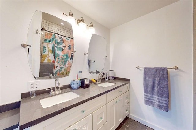 bathroom with vanity and tile patterned floors