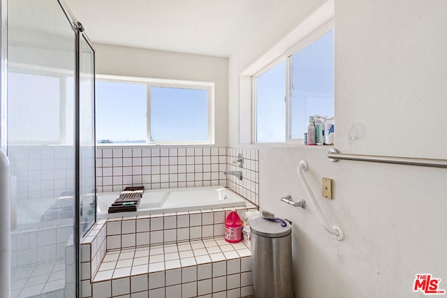 bathroom with independent shower and bath