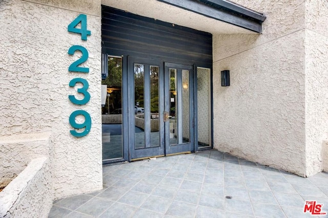 entrance to property with french doors