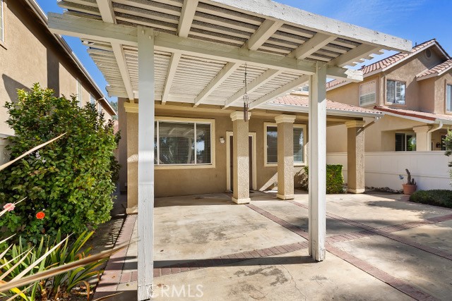 view of patio featuring a pergola