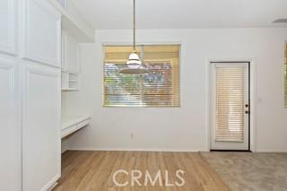 unfurnished dining area featuring light hardwood / wood-style flooring