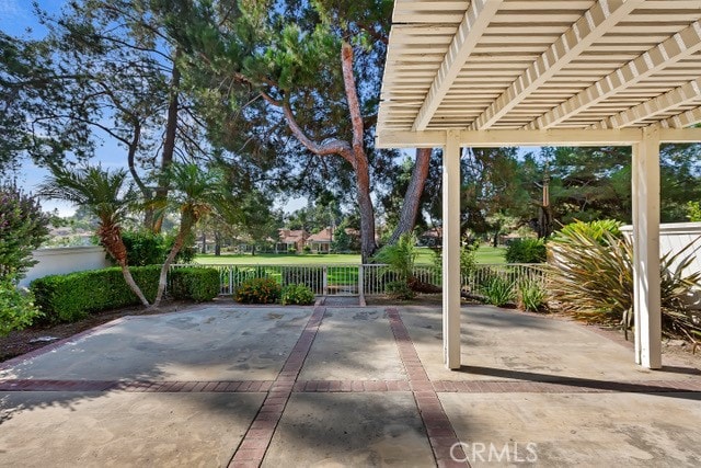 view of patio featuring a pergola