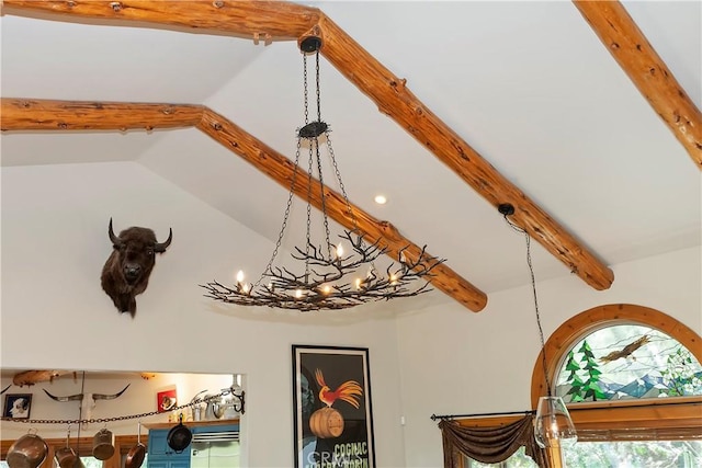 room details featuring beam ceiling and an inviting chandelier