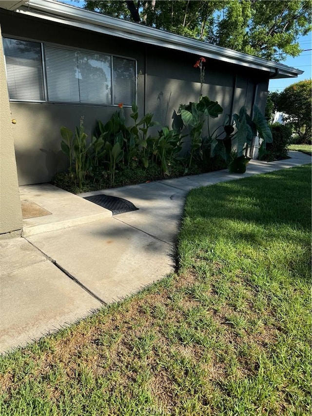 exterior space with a lawn