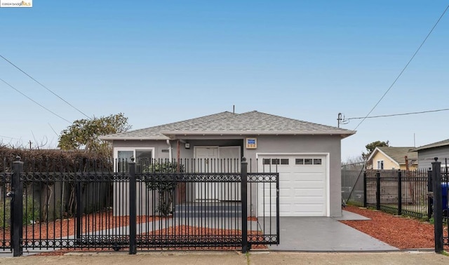 view of front of property with a garage