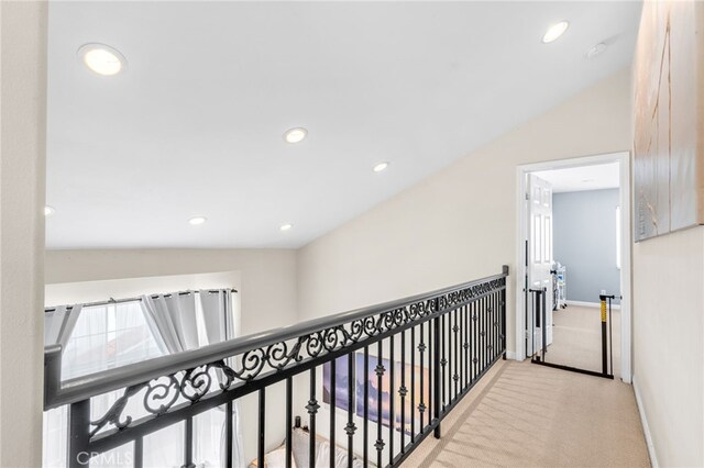 hall featuring baseboards, carpet floors, and recessed lighting