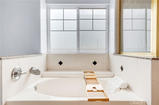 full bathroom with a garden tub