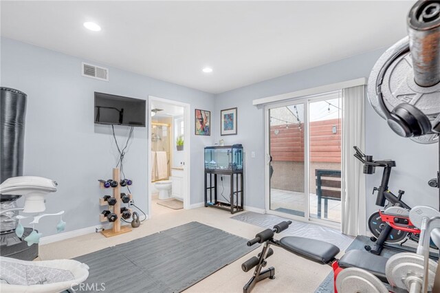 workout area with carpet floors, recessed lighting, visible vents, and baseboards