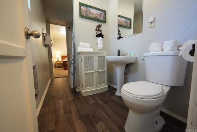 39414 Ruby Ln, Big Bear Lake, CA 92315 - bathroom with wood finished floors, toilet, and baseboards