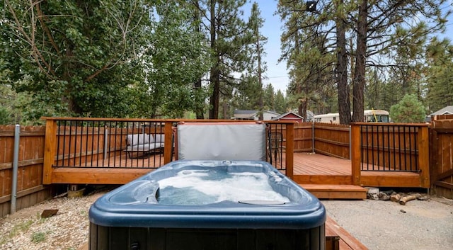39414 Ruby Ln, Big Bear Lake, CA 92315 - deck featuring a hot tub and a fenced backyard