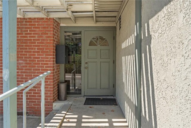 613 E Chapman Ave, Fullerton, CA 92831 - property entrance with brick siding
