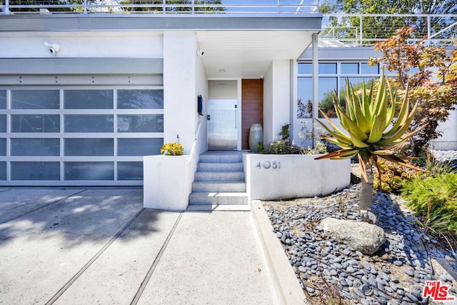 property entrance with a garage