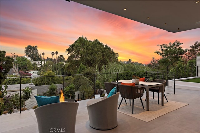 view of patio terrace at dusk