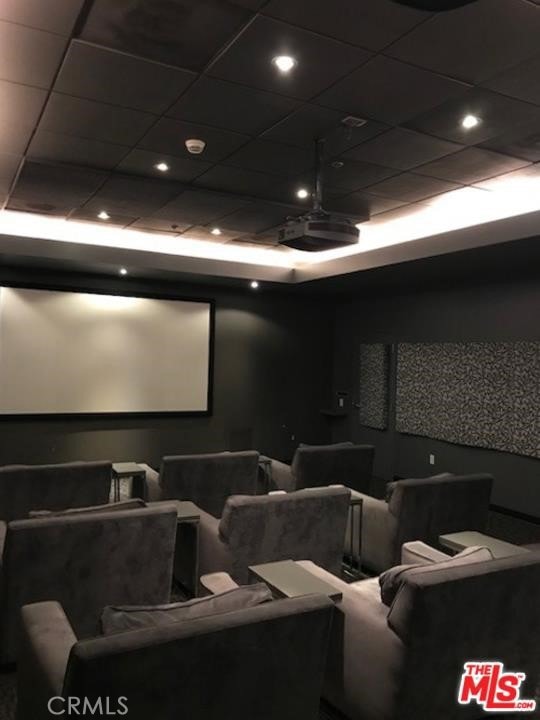 home theater room with a drop ceiling