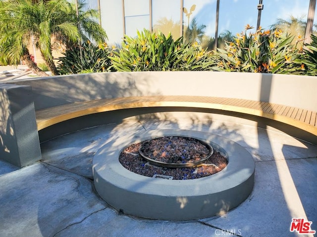 view of patio / terrace featuring a fire pit