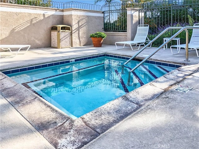 260 Cagney Ln Unit 105, Newport Beach, CA 92663 - view of pool featuring a patio and a pool