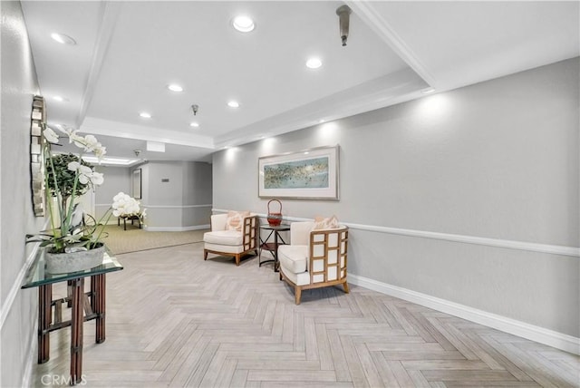 260 Cagney Ln Unit 105, Newport Beach, CA 92663 - living area featuring baseboards, recessed lighting, and a tray ceiling