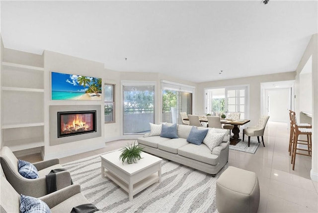 living room with light tile patterned floors