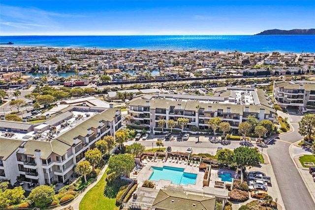 260 Cagney Ln Unit 105, Newport Beach, CA 92663 - bird's eye view of a nearby body of water and a pool area
