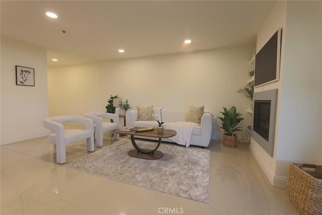 260 Cagney Ln Unit 105, Newport Beach, CA 92663 - living area featuring recessed lighting and a glass covered fireplace