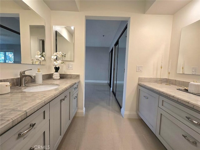 260 Cagney Ln Unit 105, Newport Beach, CA 92663 - bathroom featuring vanity and tile patterned flooring