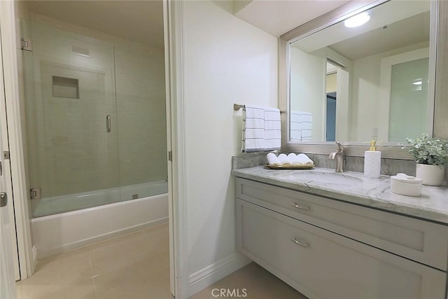 260 Cagney Ln Unit 105, Newport Beach, CA 92663 - full bath with vanity, bath / shower combo with glass door, and tile patterned floors
