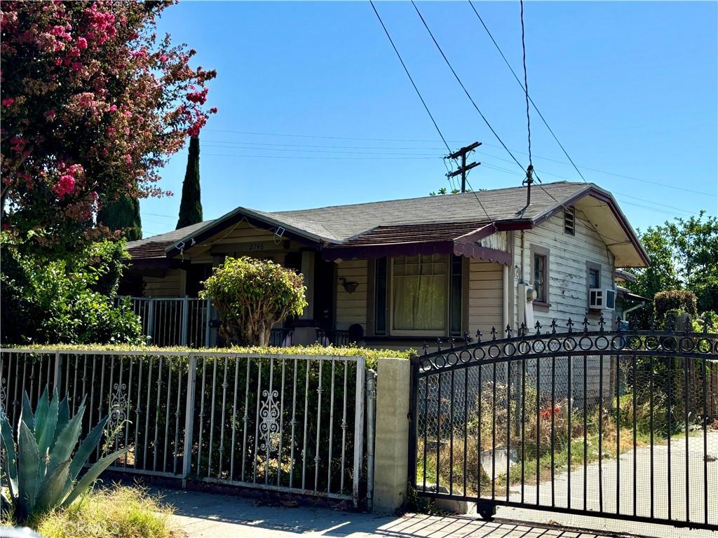 2746 Benedict St, Los Angeles, CA 90039 - view of front facade featuring a fenced front yard, a shingled roof, and a gate