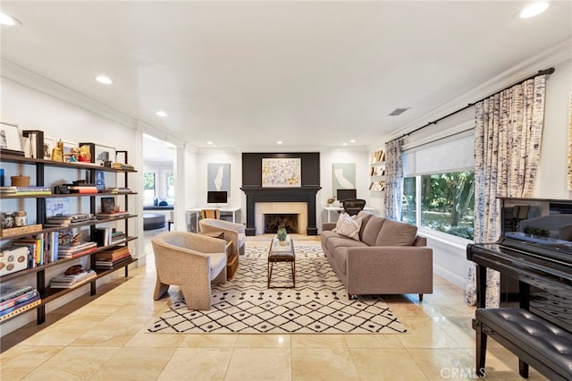 tiled living room with crown molding and a wealth of natural light