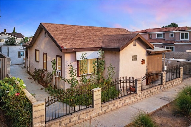 view of front of home featuring cooling unit