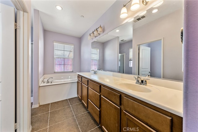 bathroom with shower with separate bathtub, tile patterned floors, and vanity