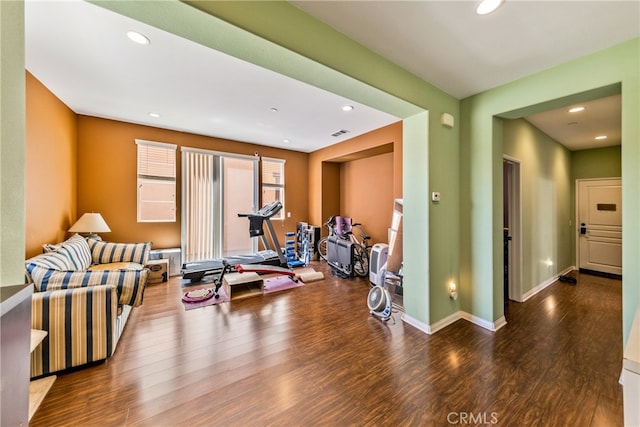 exercise room featuring wood-type flooring