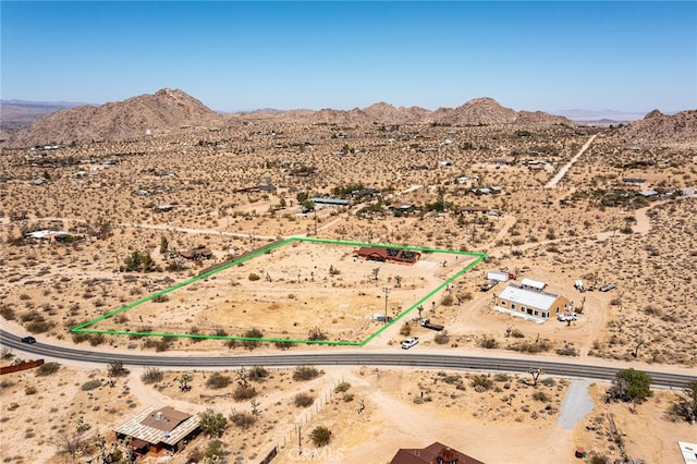 drone / aerial view featuring a mountain view