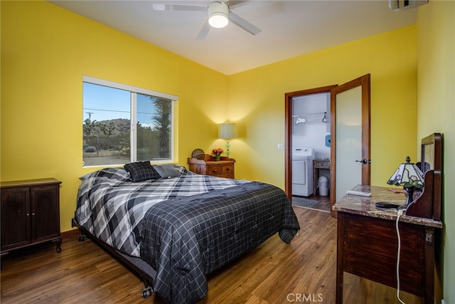 bedroom featuring ceiling fan, washer / clothes dryer, and hardwood / wood-style flooring