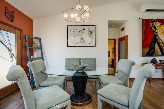 dining space with a notable chandelier, lofted ceiling, hardwood / wood-style floors, and a wall unit AC