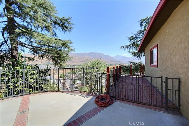 view of patio featuring a mountain view