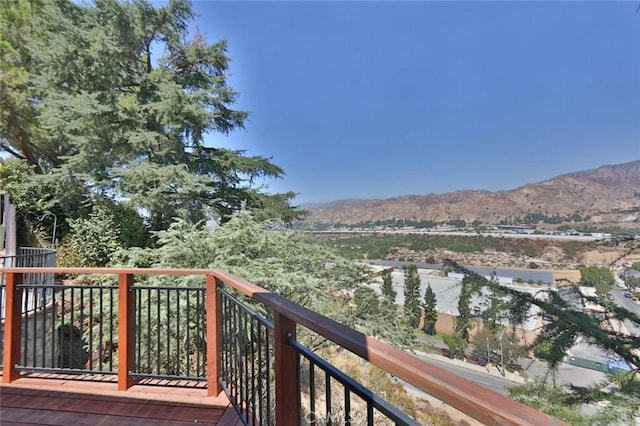 wooden terrace with a mountain view