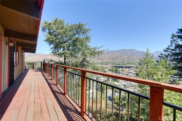 balcony featuring a mountain view