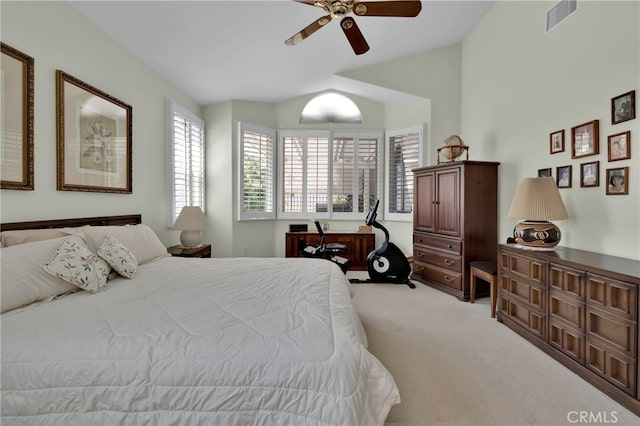 bedroom with carpet, vaulted ceiling, and ceiling fan