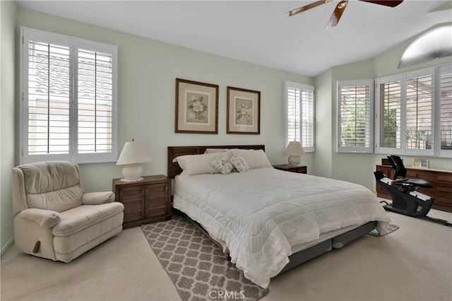 bedroom featuring ceiling fan and carpet flooring