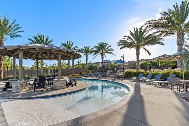 view of swimming pool with a gazebo and a patio