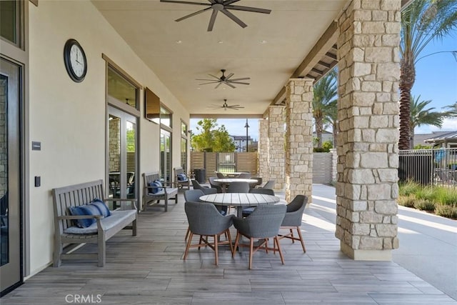 view of patio featuring ceiling fan