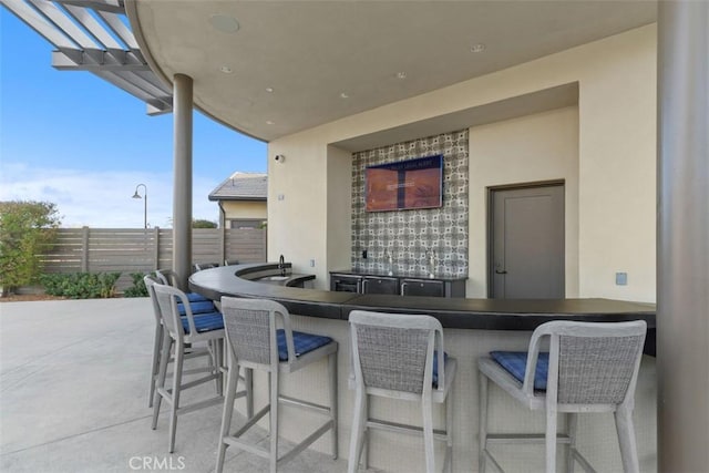 view of patio / terrace featuring a bar