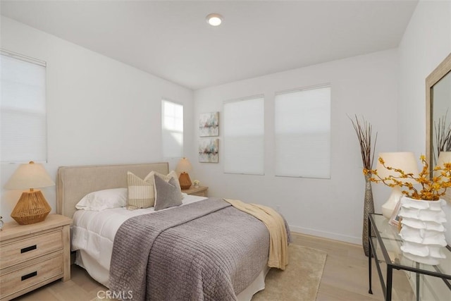 bedroom featuring light wood-type flooring