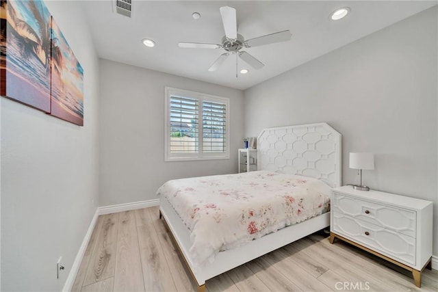 bedroom featuring ceiling fan and light wood-type flooring