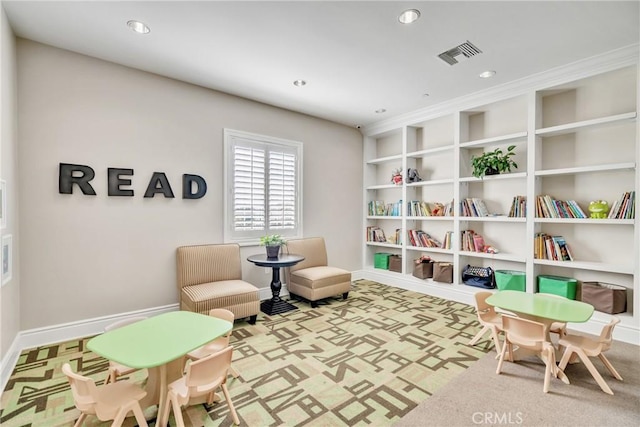 living area with carpet flooring